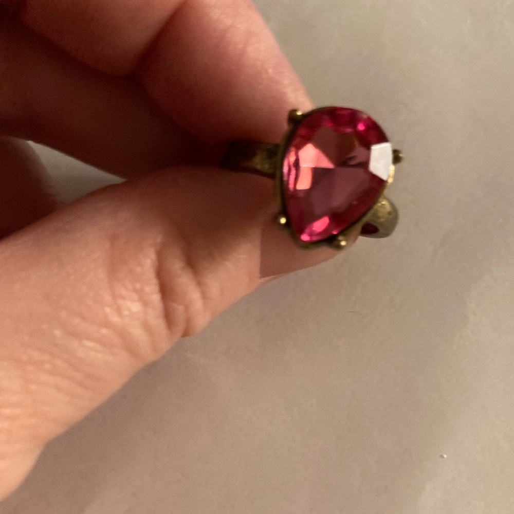 It’s big, bronze, and gaudy. Costume jewelry at its finest!